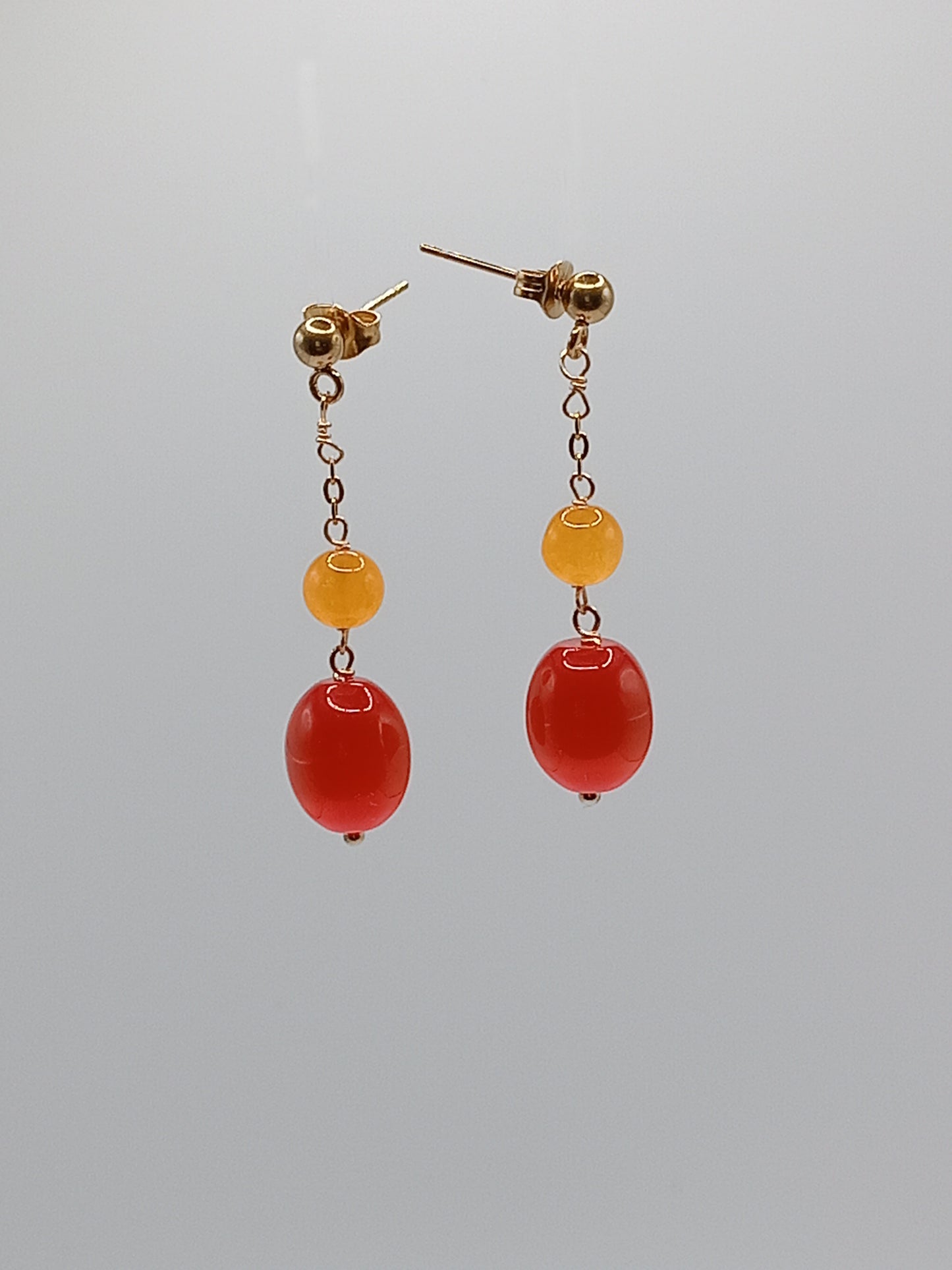 Mini boucles d'oreilles jus d'orange